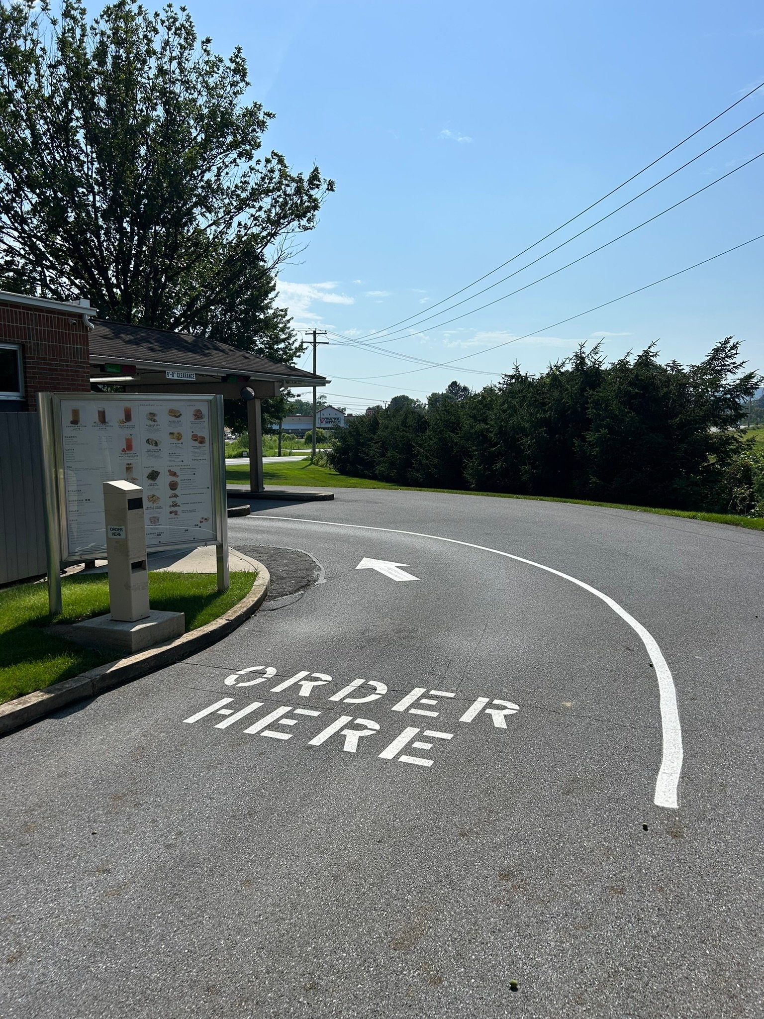 Snow plow damage on parking lot markings and faded yellow curbs in Lancaster PA