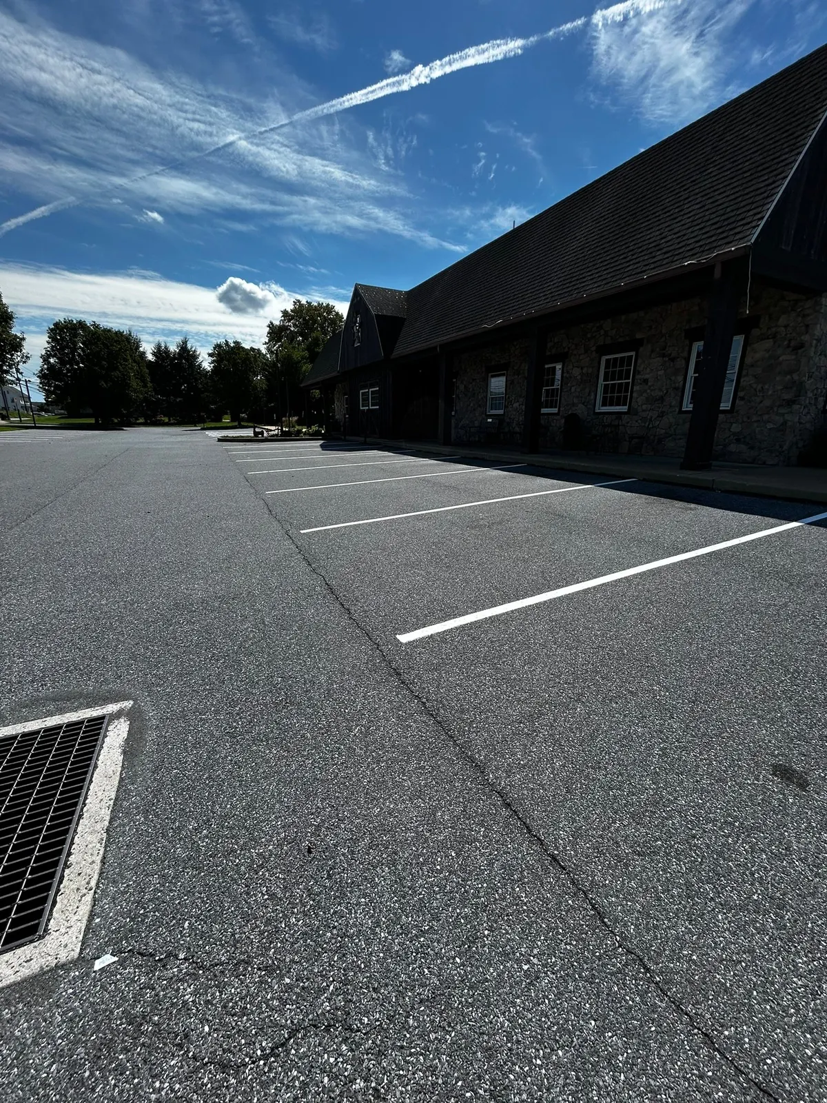 Fresh white stall lines in a stone building lot
