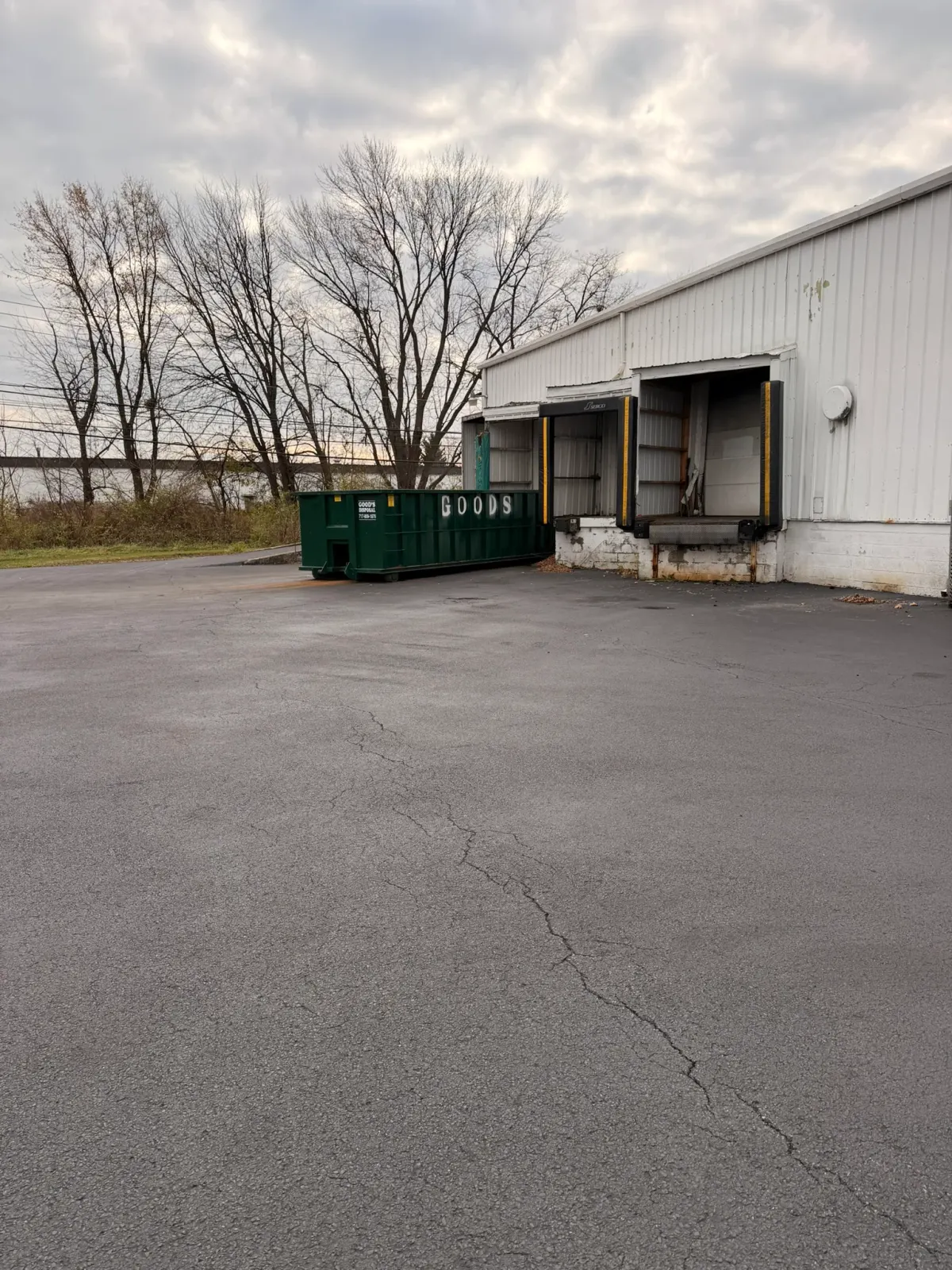 Warehouse loading dock apron with sealed asphalt