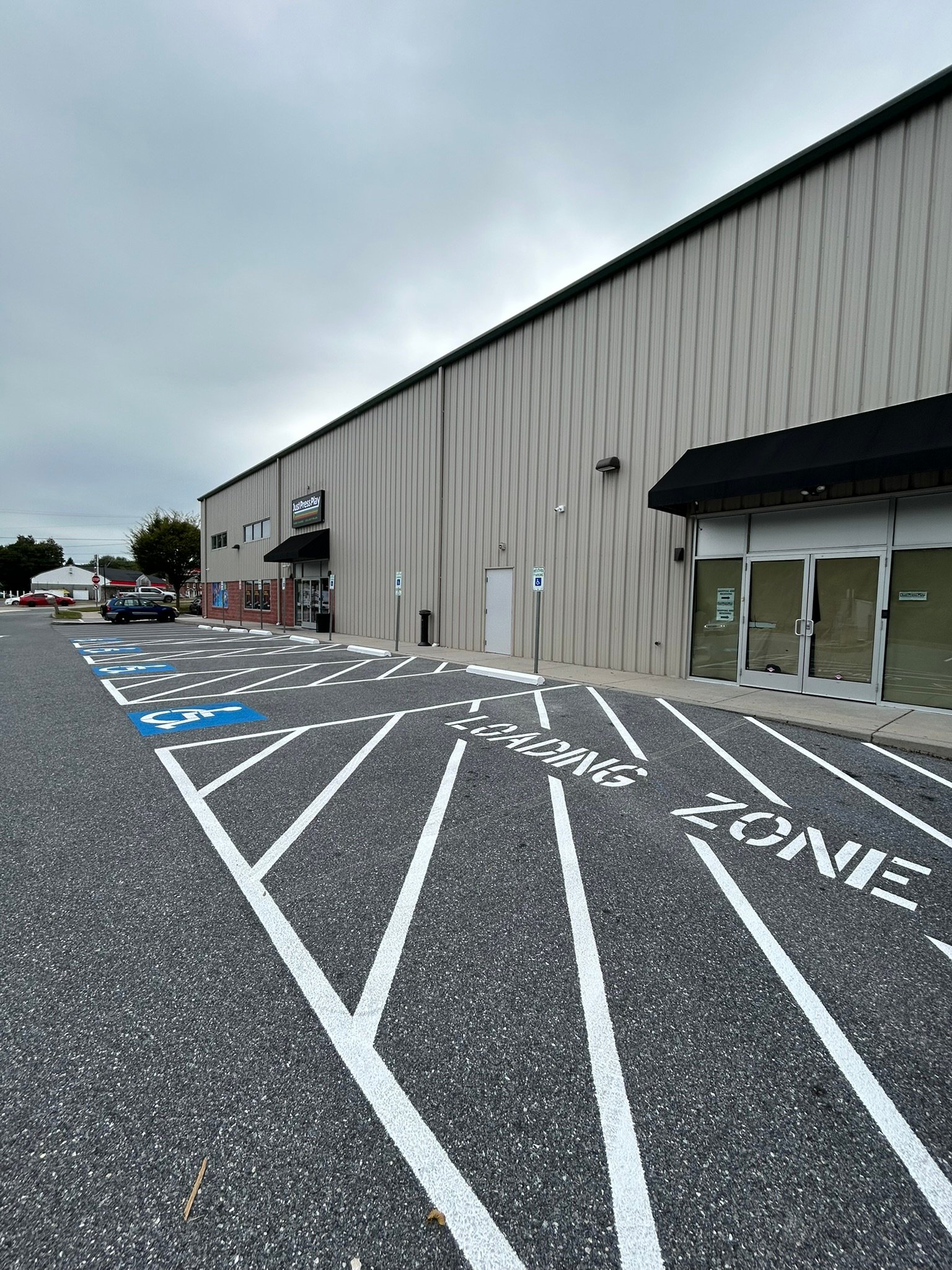 ADA Parking Spaces + Loading Zone Striping for a Commercial Retail Building in Lancaster County, PA